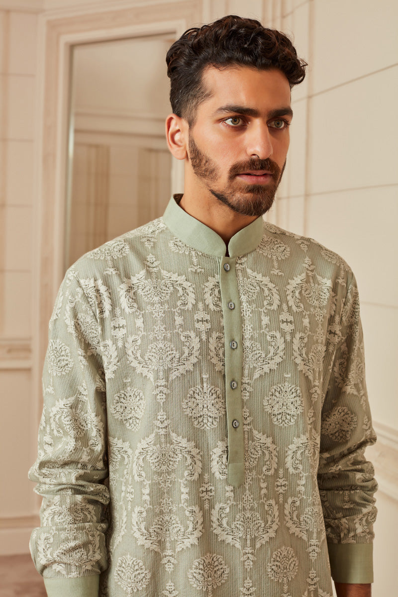 Light Green Printed And All Over Top Stitched Kurta Set